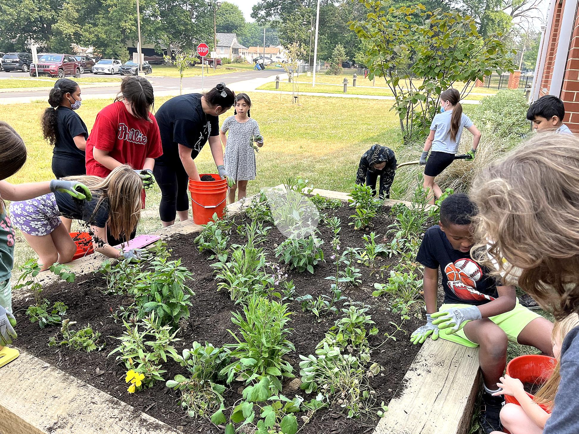 Children planning an eco club meeting