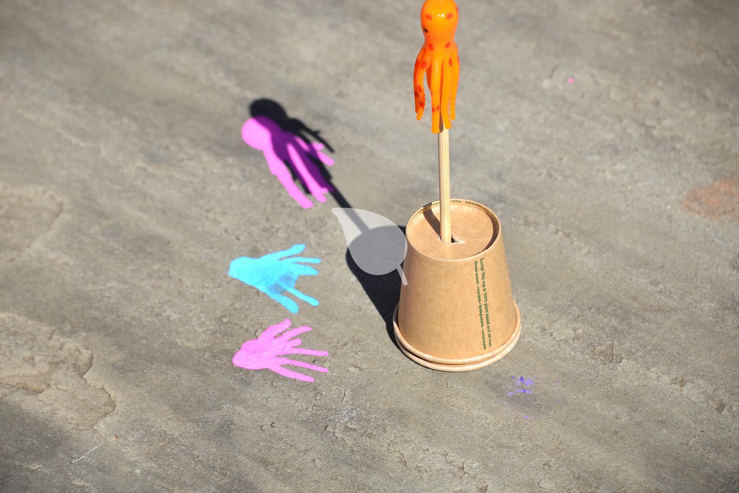 Child measuring shadow length outdoors