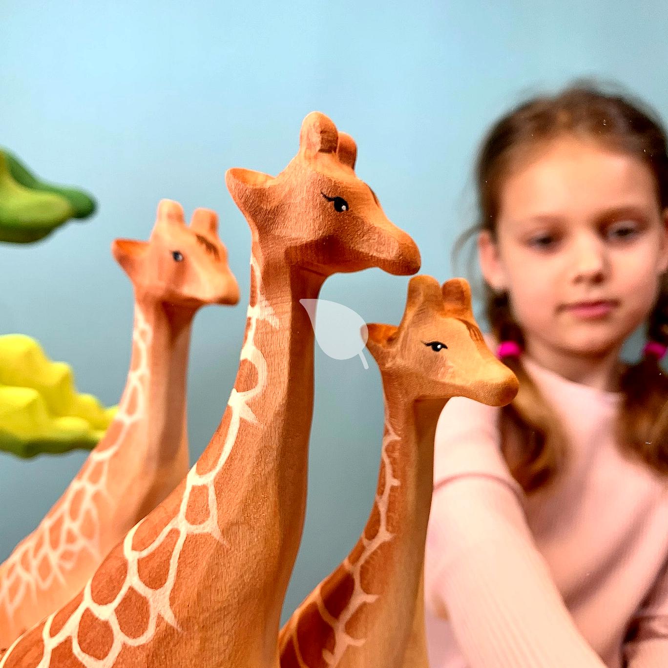 Family recycling toys together illustrating eco-conscious parenting
